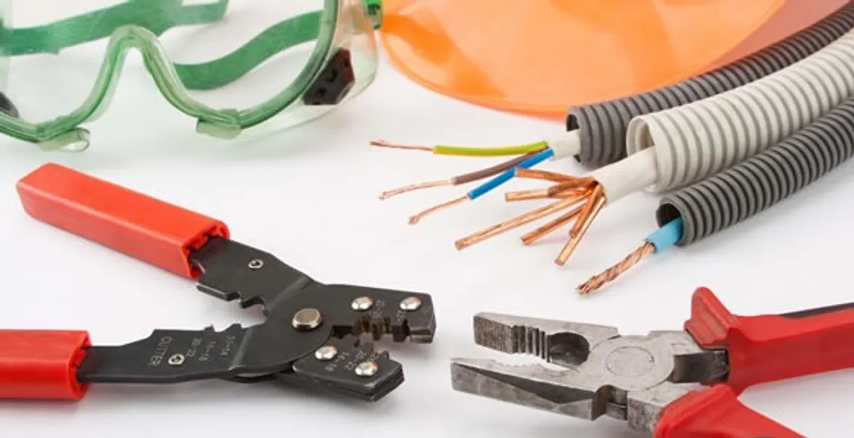 Electrical wiring repair with professional tools and safety equipment in Greendale, WI