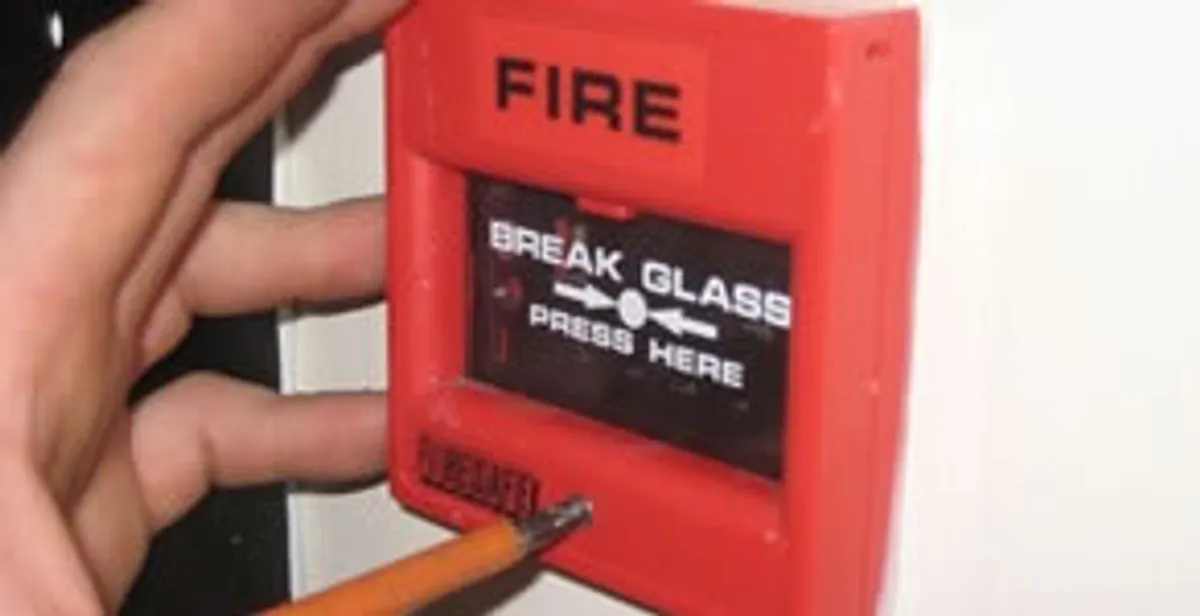 fire alarm installation service showing manual fire alarm pull station installed by licensed electricians in Milwaukee, WI